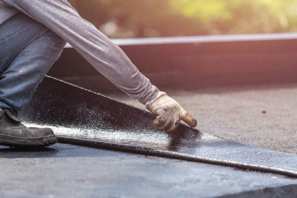 Professional Waterproofing technician working in Rome City, IN